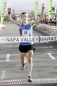 kevin crossing the finish line