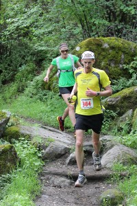 Galen Farris and pacer Jen Pfiefer in the hunt for a PR and age group win. (Photo by Sean Dulany/Freeplay Magazine)