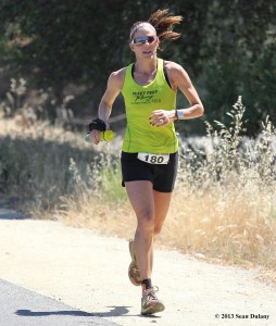 Women's winner Jen Pfeifer powers to the finish. (Photo by Sean Dulany/Freeplay Magazine)