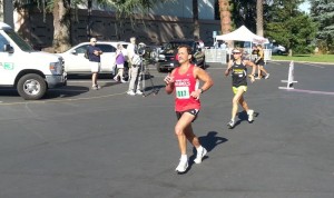 Kevin Cimini gets chased to the finish by Carol Parise. (SRN photo)