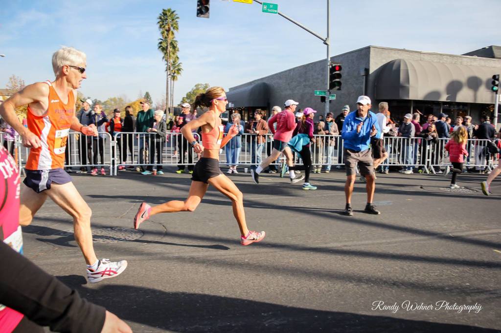 Three of the region's top masters runners: Terry Baucom, Midori Sperandeo, and a cheering Rich Hanna. (Photo courtesy of Randy Wehner Photography.)